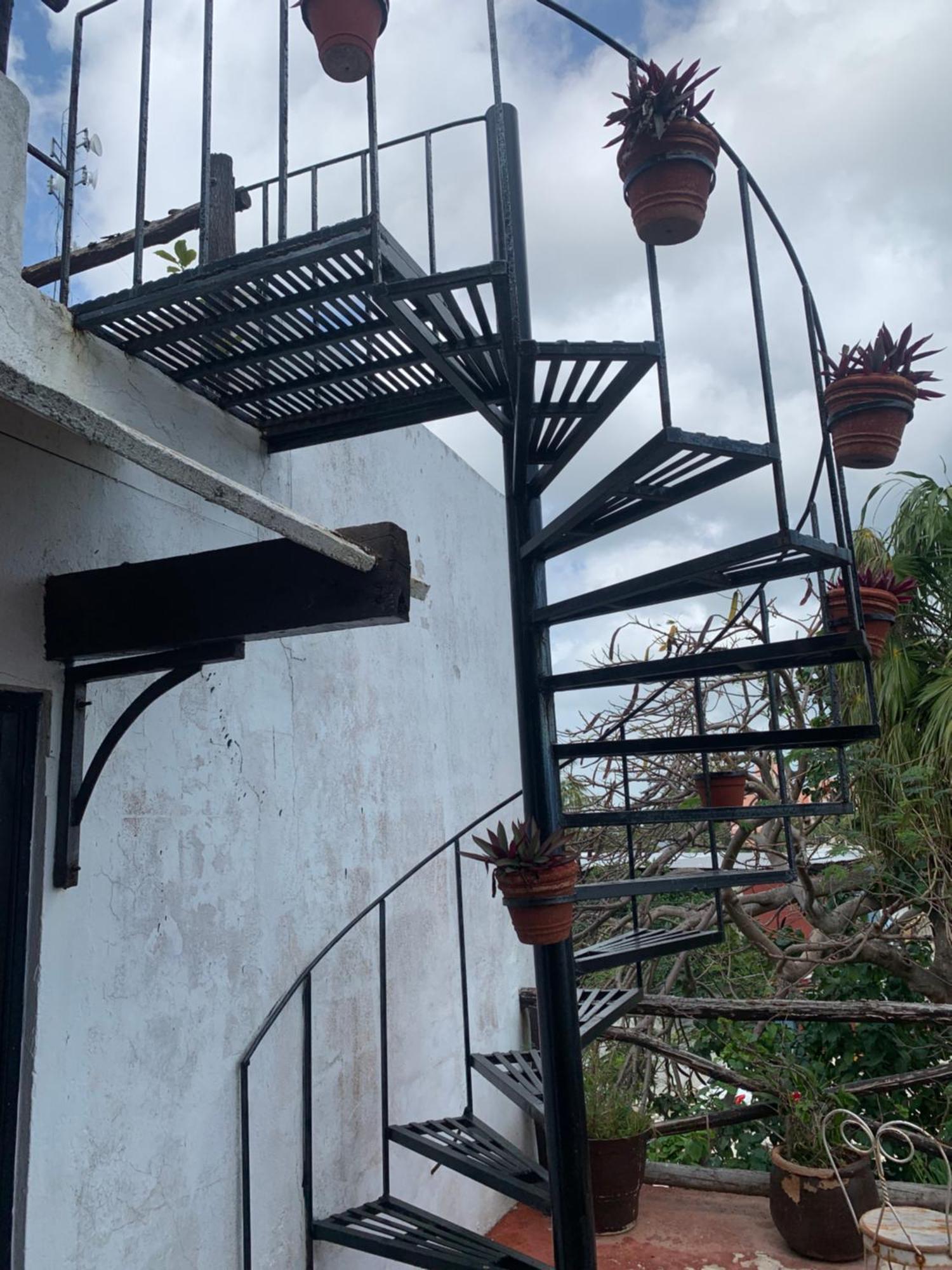 Casa Caribe Cancún Extérieur photo Spiral staircase