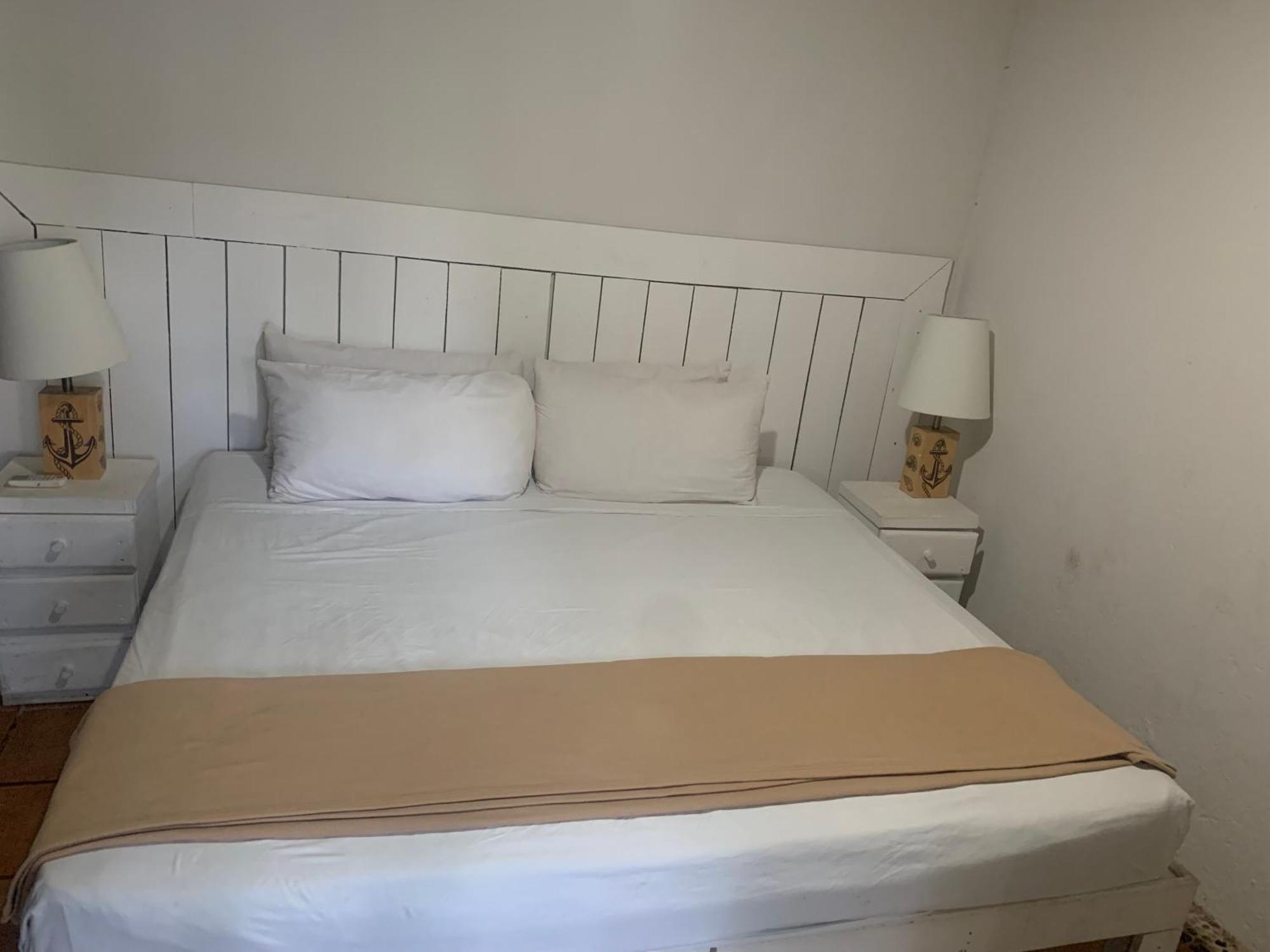 Casa Caribe Cancún Extérieur photo A bed