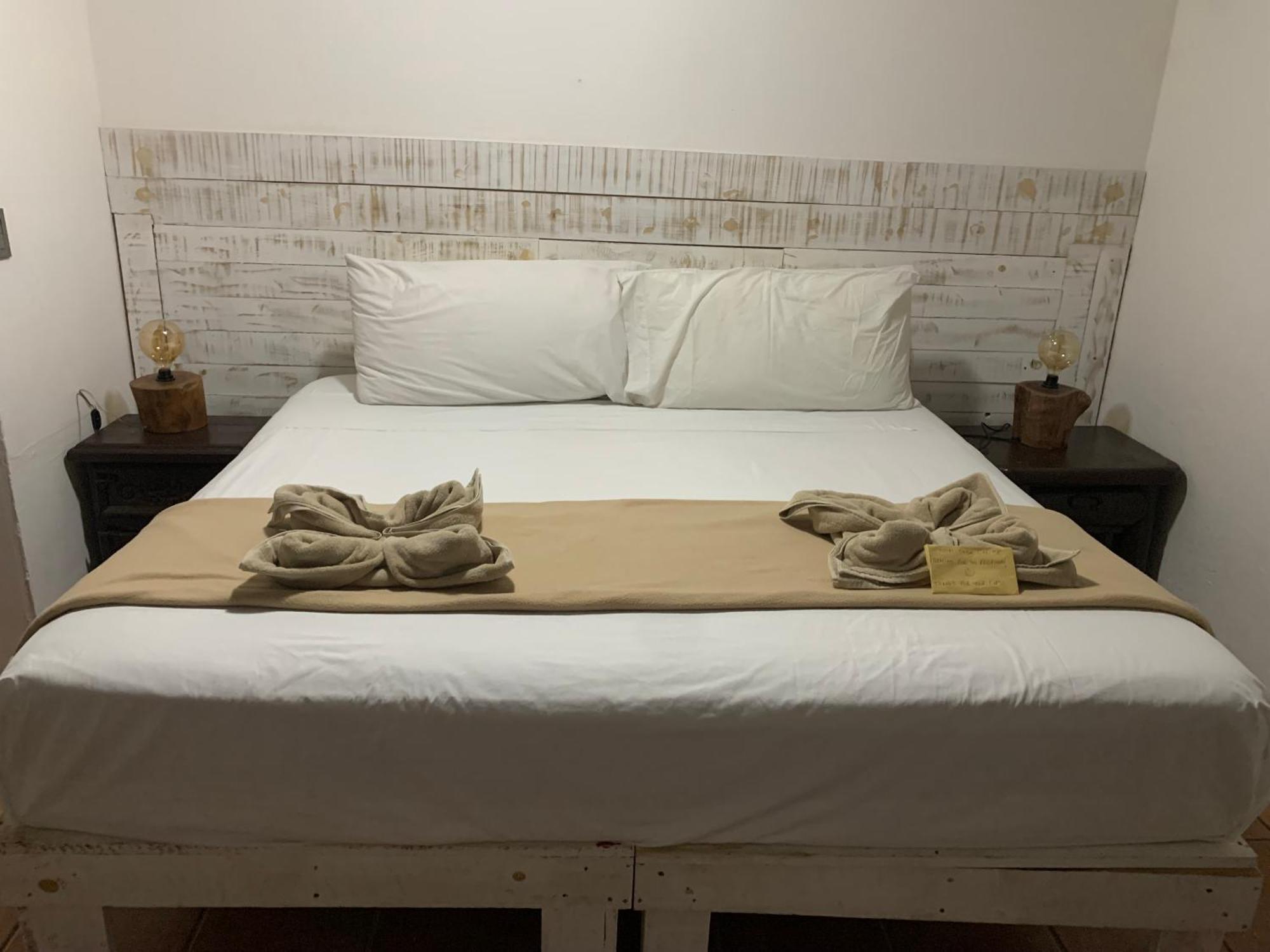 Casa Caribe Cancún Extérieur photo A bed
